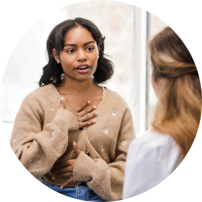 A woman talking to her doctor